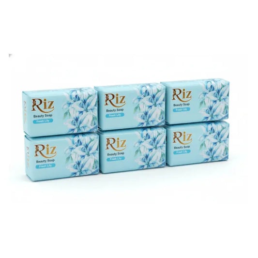 Six bars of Riz Fresh Lily beauty soap for smooth skin arranged on a plain white background.