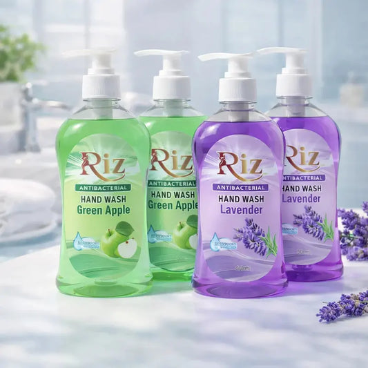 Four bottles of Riz antibacterial hand wash in Green Apple and Lavender scents for germ protection.