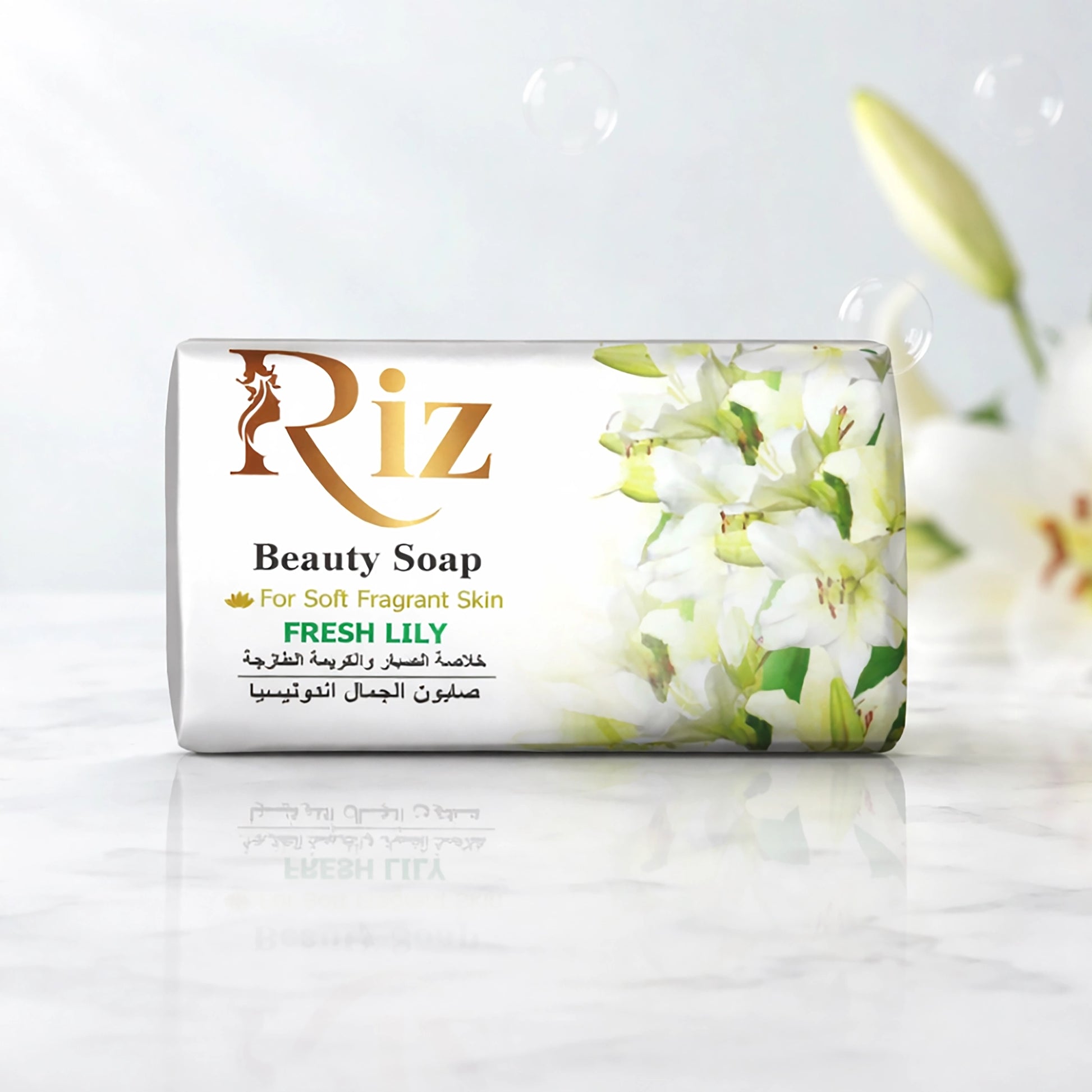 Riz Beauty Soap bar with fresh lily scent and white flower illustrations.